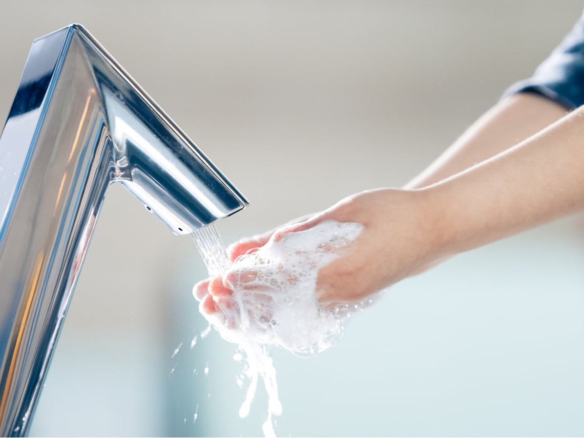 Child rinsing hands